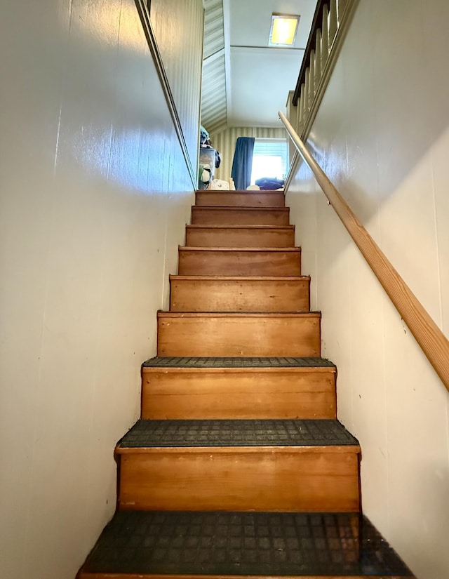 755 Main St, Calais, ME 04619 - staircase featuring vaulted ceiling