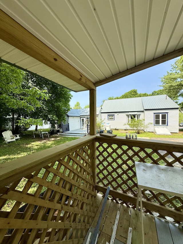 755 Main St, Calais, ME 04619 - wooden terrace featuring a residential view