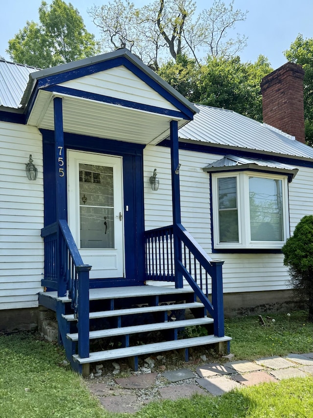 755 Main St, Calais, ME 04619 - view of front of house with a metal roof