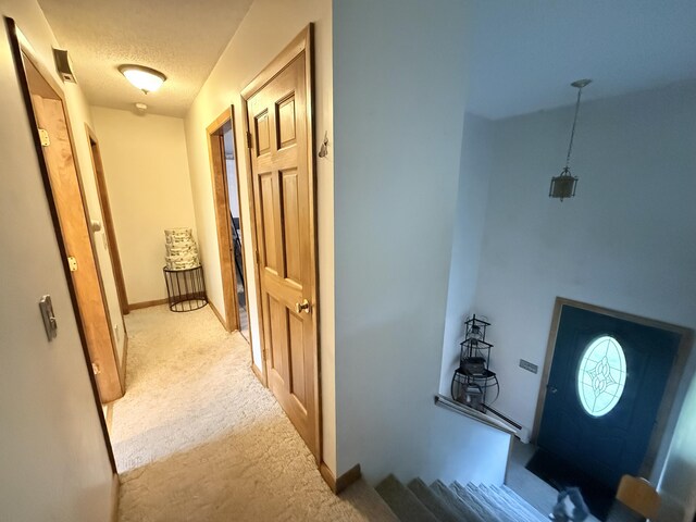 211 Hinckley Hill Rd, Carmel, ME 04419 - hall featuring carpet floors and a textured ceiling