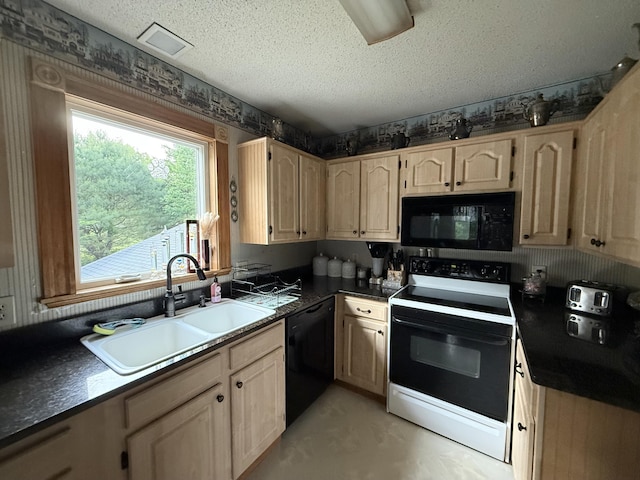 211 Hinckley Hill Rd, Carmel, ME 04419 - kitchen featuring black appliances, dark countertops, and a textured ceiling