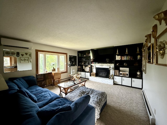 211 Hinckley Hill Rd, Carmel, ME 04419 - living room featuring a wall mounted air conditioner, carpet floors, baseboard heating, a textured ceiling, and a brick fireplace