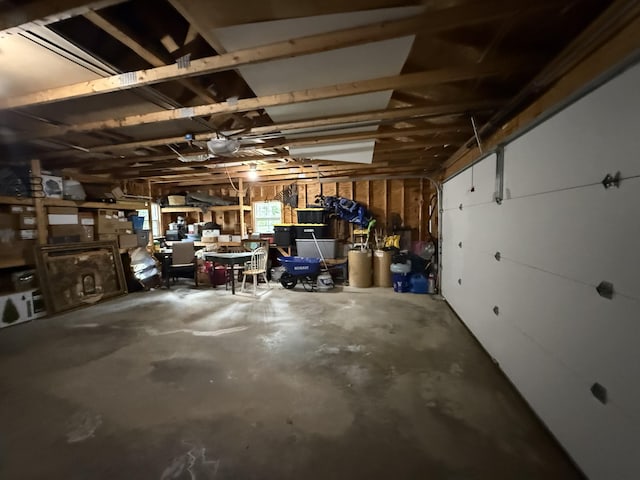 211 Hinckley Hill Rd, Carmel, ME 04419 - garage with a garage door opener and a workshop area