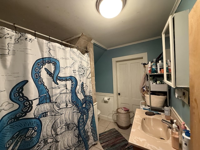 58 Elm St, Old Town, ME 04468 - full bath with tile patterned flooring, wainscoting, curtained shower, ornamental molding, and vanity