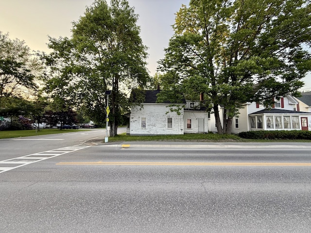 58 Elm St, Old Town, ME 04468 - view of front facade with stone siding