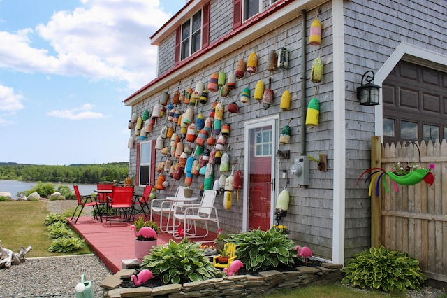 552 Port Rd, Machiasport, ME 04655 - exterior space with a deck with water view and outdoor dining area