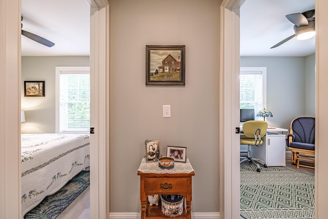 144 Ridley Rd, Sanford, ME 04073 - corridor featuring healthy amount of natural light and a desk