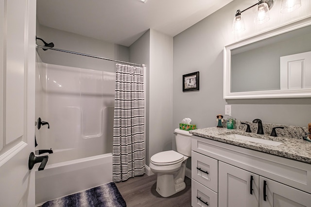 144 Ridley Rd, Sanford, ME 04073 - full bathroom with wood finished floors, vanity, and shower / tub combo with curtain