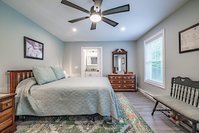 144 Ridley Rd, Sanford, ME 04073 - bedroom with wood finished floors, recessed lighting, ceiling fan, and ensuite bath