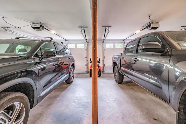 144 Ridley Rd, Sanford, ME 04073 - garage featuring a garage door opener