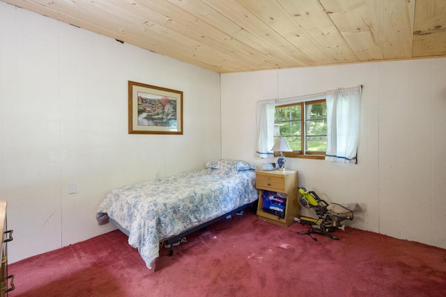 19 Davis Ln, Burnham, ME 04922 - bedroom with wood ceiling, carpet, and wooden walls