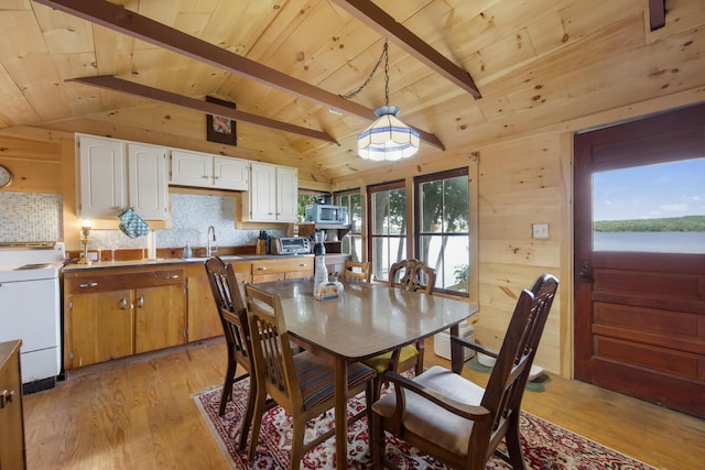 19 Davis Ln, Burnham, ME 04922 - dining space with wooden ceiling, light wood-style floors, and wood walls