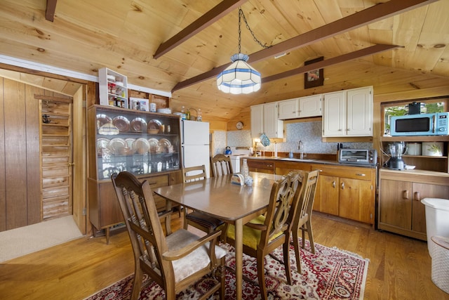 19 Davis Ln, Burnham, ME 04922 - dining area with wooden ceiling, light wood-type flooring, and wood walls