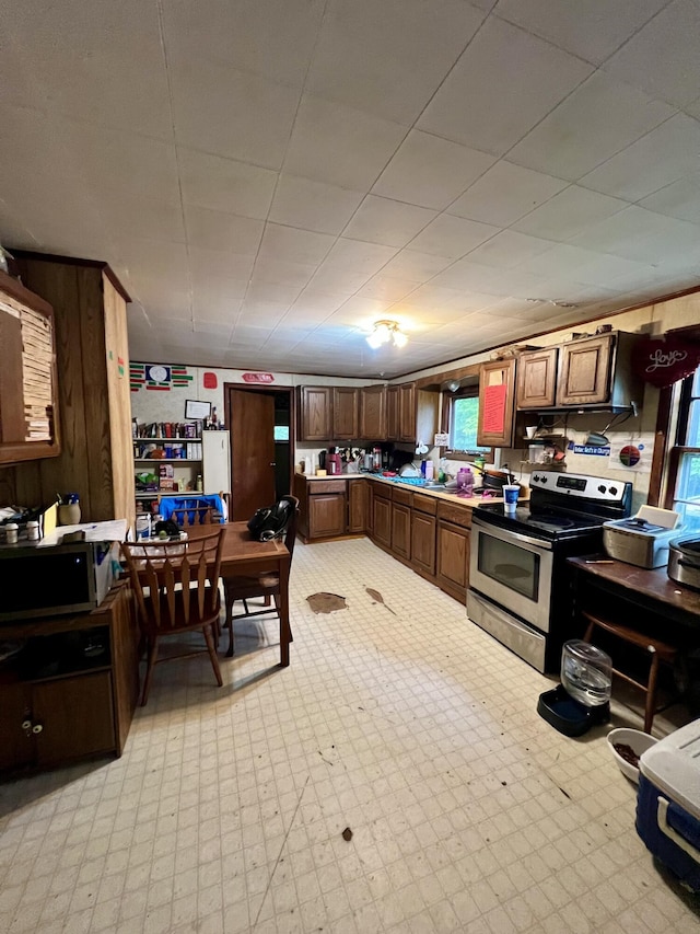 358 Swain Rd, Rumford, ME 04276 - kitchen with electric stove, light floors, and light countertops