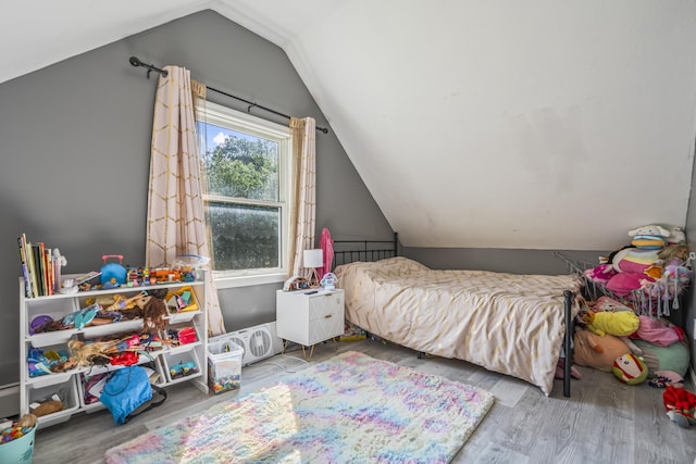 104 Chick Rd, Lebanon, ME 04027 - bedroom featuring vaulted ceiling and wood finished floors