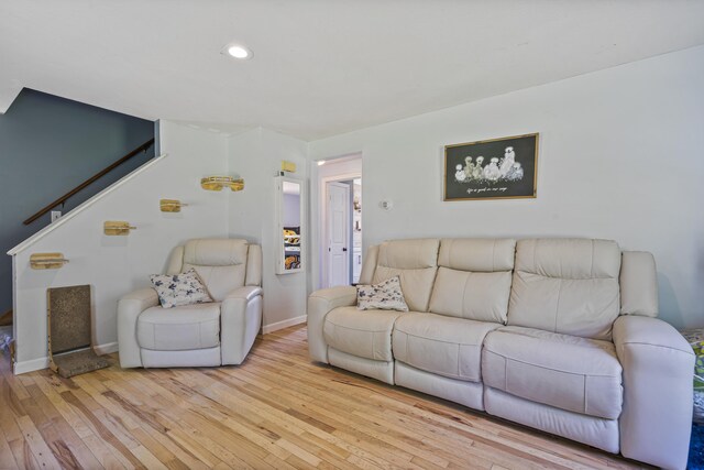 104 Chick Rd, Lebanon, ME 04027 - living area with hardwood / wood-style floors, stairway, and recessed lighting