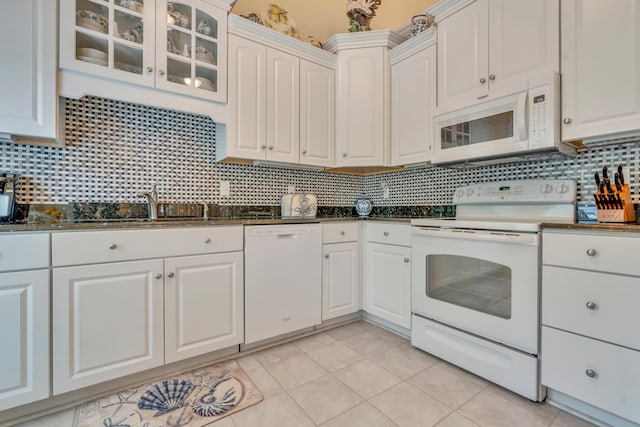 86 Farragut Way Unit 86, Kennebunk, ME 04043 - kitchen with white appliances, tasteful backsplash, white cabinets, and glass insert cabinets