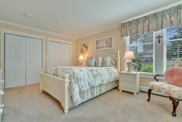 86 Farragut Way Unit 86, Kennebunk, ME 04043 - bedroom with carpet floors, multiple closets, ornamental molding, and a baseboard radiator