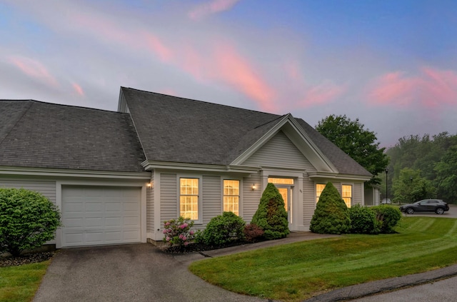 86 Farragut Way Unit 86, Kennebunk, ME 04043 - view of front of property with an attached garage, driveway, a yard, and a shingled roof