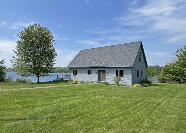 31 Deer Run, Lamoine, ME 04605 - cape cod-style house with a front yard, roof with shingles, and a water view