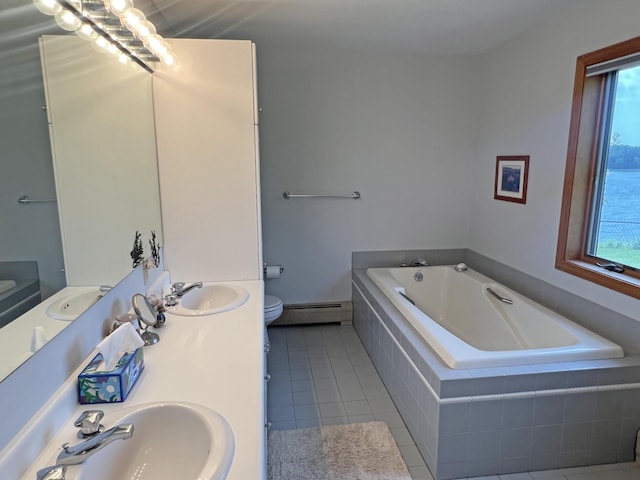 31 Deer Run, Lamoine, ME 04605 - full bathroom featuring a baseboard heating unit, a garden tub, tile patterned floors, and double vanity
