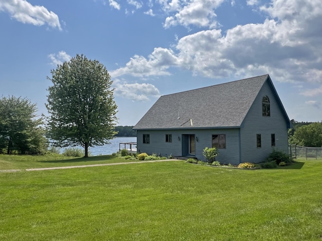 31 Deer Run, Lamoine, ME 04605 - view of front of home with a shingled roof and a water view