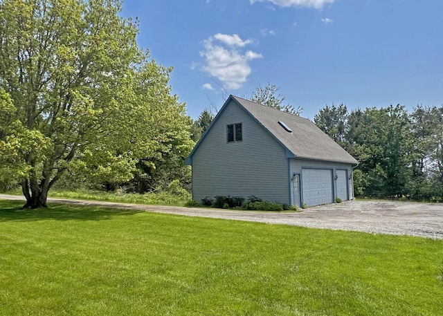 31 Deer Run, Lamoine, ME 04605 - view of side of property with a garage and a yard
