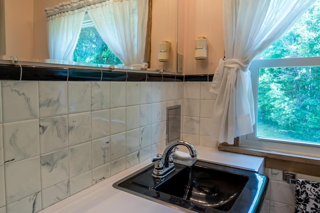 69 Garfield Rd, Auburn, ME 04210 - detailed view of a sink and decorative backsplash