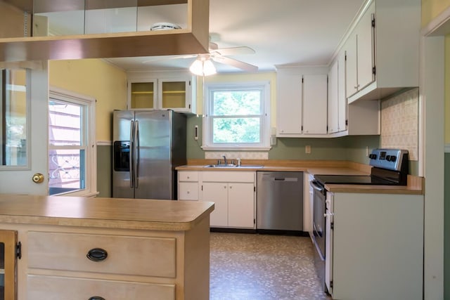69 Garfield Rd, Auburn, ME 04210 - kitchen with stainless steel appliances, a ceiling fan, white cabinets, and light countertops