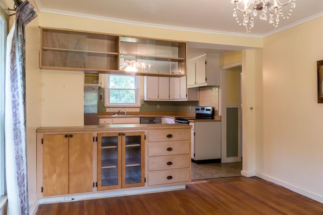 69 Garfield Rd, Auburn, ME 04210 - kitchen with electric range, ornamental molding, dark wood-style flooring, freestanding refrigerator, and a chandelier