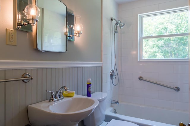 69 Garfield Rd, Auburn, ME 04210 - full bathroom with shower / bathtub combination and a wainscoted wall