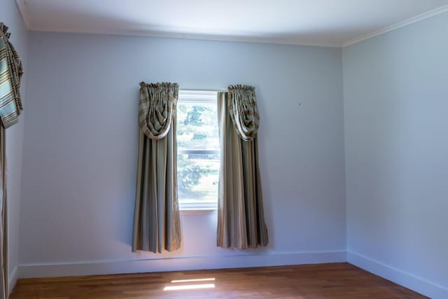 69 Garfield Rd, Auburn, ME 04210 - empty room with ornamental molding and wood finished floors