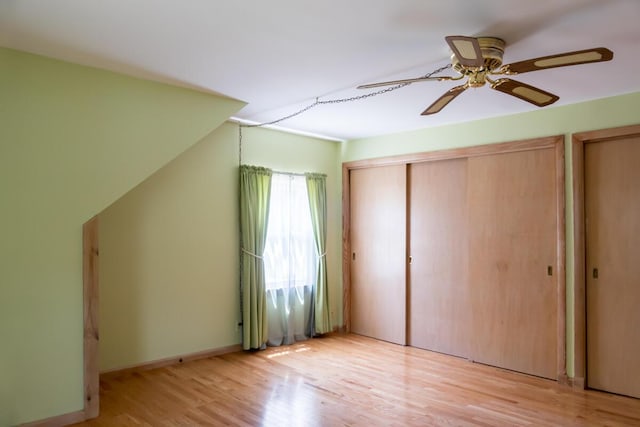 69 Garfield Rd, Auburn, ME 04210 - unfurnished bedroom featuring light wood-style flooring and a ceiling fan