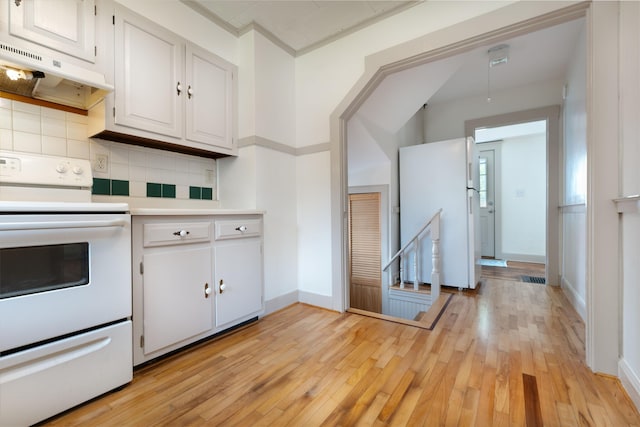 10 Dike Rd, Bath, ME 04530 - kitchen featuring white appliances, under cabinet range hood, backsplash, white cabinets, and light countertops