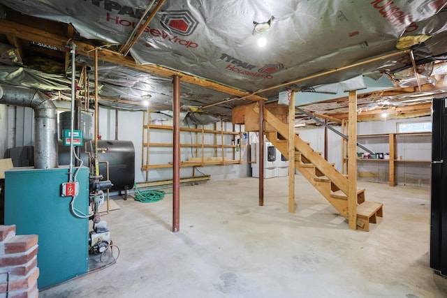 9 Jean St, Kittery, ME 03904 - unfinished basement with heating fuel, stairs, a heating unit, and washer / clothes dryer