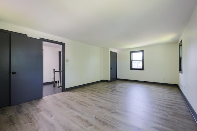 9 Jean St, Kittery, ME 03904 - empty room with wood finished floors