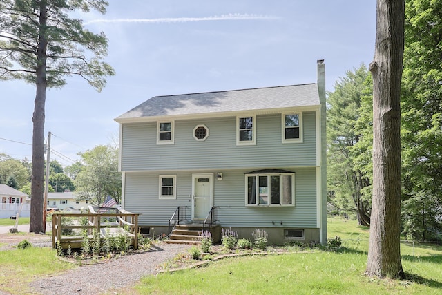 9 Jean St, Kittery, ME 03904 - colonial home featuring a chimney and a front yard