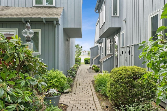 135 Ocean Ave Unit 15, Kennebunkport, ME 04046 - view of home's exterior with roof with shingles