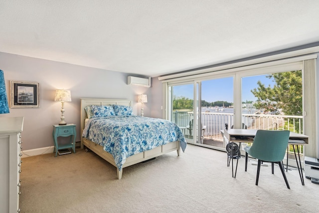 135 Ocean Ave Unit 15, Kennebunkport, ME 04046 - carpeted bedroom with a wall mounted air conditioner, access to outside, and multiple windows