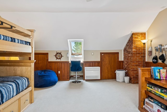 135 Ocean Ave Unit 15, Kennebunkport, ME 04046 - carpeted bedroom with lofted ceiling, wainscoting, and wood walls