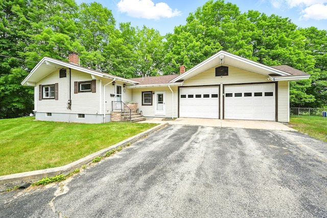 22 Sanborn Cir, Norway, ME 04268 - ranch-style house with a chimney, asphalt driveway, and a shingled roof