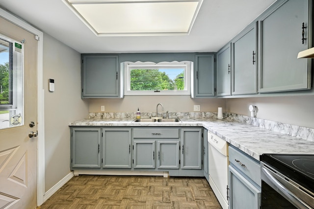 22 Sanborn Cir, Norway, ME 04268 - kitchen with white dishwasher, gray cabinets, and healthy amount of natural light