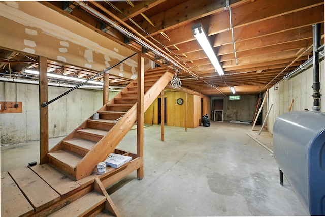 22 Sanborn Cir, Norway, ME 04268 - unfinished basement featuring oil tank and stairway