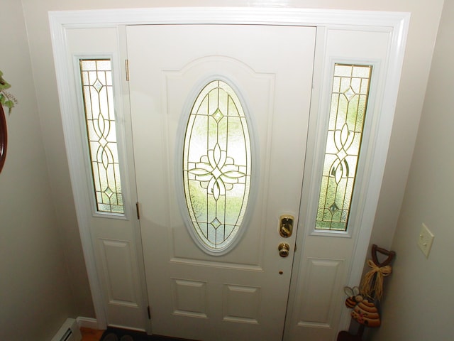 976 Essex St, Bangor, ME 04401 - foyer entrance with baseboard heating