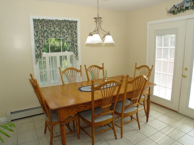 976 Essex St, Bangor, ME 04401 - dining area featuring baseboard heating and light tile patterned flooring