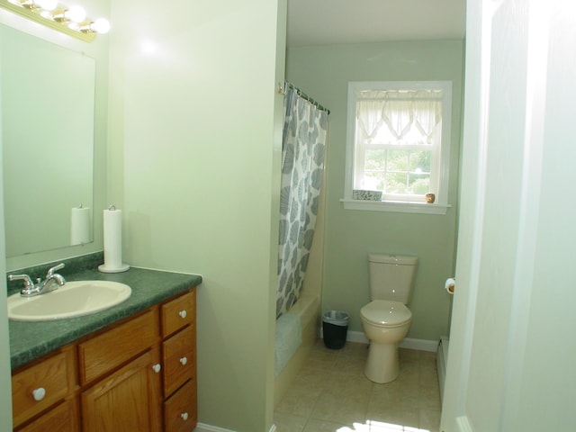 976 Essex St, Bangor, ME 04401 - full bath featuring vanity, tile patterned floors, and shower / bath combination with curtain