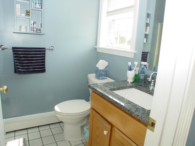 976 Essex St, Bangor, ME 04401 - bathroom with a baseboard radiator, tile patterned floors, and vanity