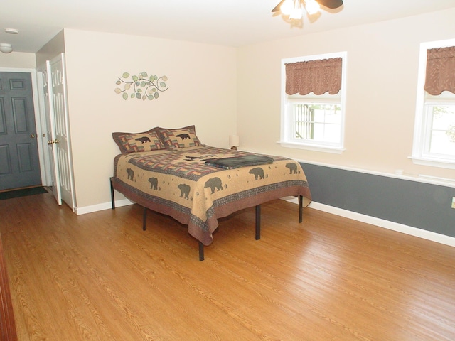 976 Essex St, Bangor, ME 04401 - bedroom with light wood-type flooring and baseboards