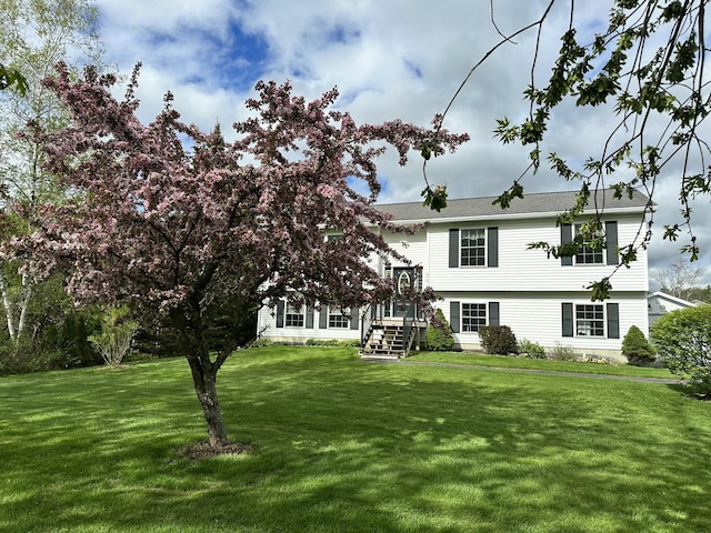 976 Essex St, Bangor, ME 04401 - back of house featuring a lawn