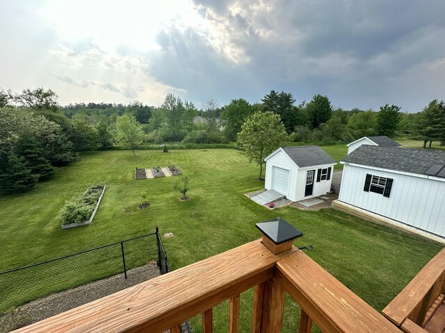 976 Essex St, Bangor, ME 04401 - view of yard featuring an outbuilding and a garage
